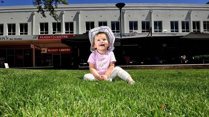 Josephine Spence 18 months enjoying the grass at Green Square. Photo: Melissa Adams