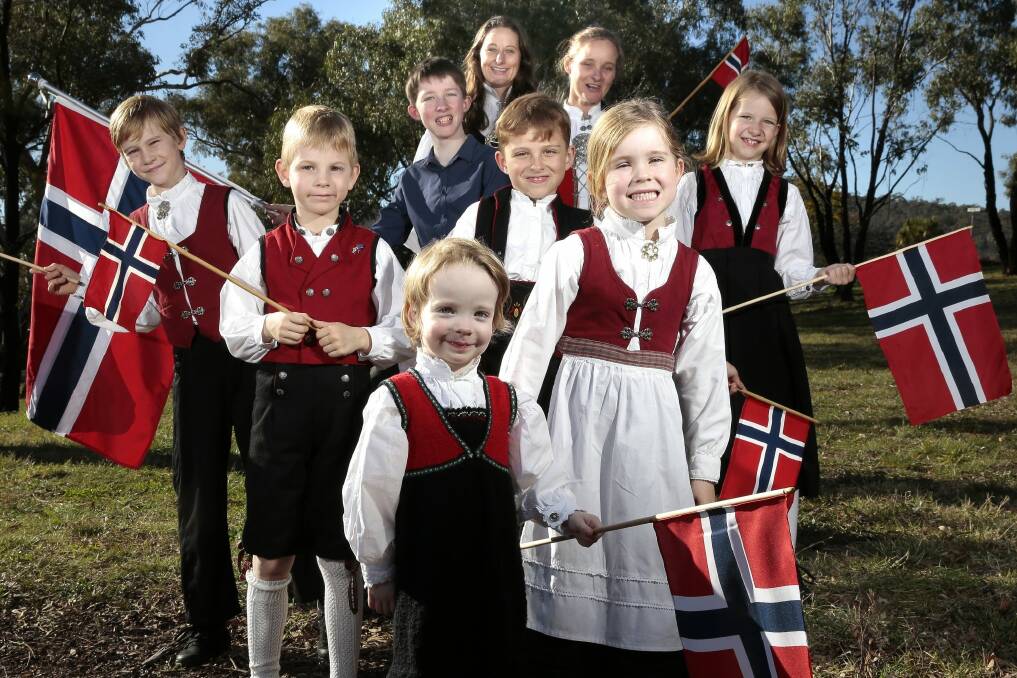 All ready for Norway's National Day Celebrations of May 17 at the Senate Rose Gardens, rear from left, Mathias Berge 14, of O'Connor, Lise Havn, of Ainslie, Janecke Willie, of Lyneham, middle from left, Joachim Willie- Bellechambers, 11, of Lyneham, Magnus Aarhaug, 6, of Campbell, Hugo Berge, 9, of O'Connor, Anna Berge, 9, of O'Connor, front from left, Nell Berge, 3, of O'Connor, and Maya Willie-Bellechambers, 6.   Photo: Jeffrey Chan