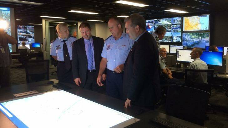Prepared?: Assistant Commissioner Katarina Carroll, Parliamentary Secretary Josh Frydenberg, Inspector Steve Donnolly from the G20 Group and Queensland Police Minister Jack Dempsey at the G20 Police Operations Centre in Brisbane.