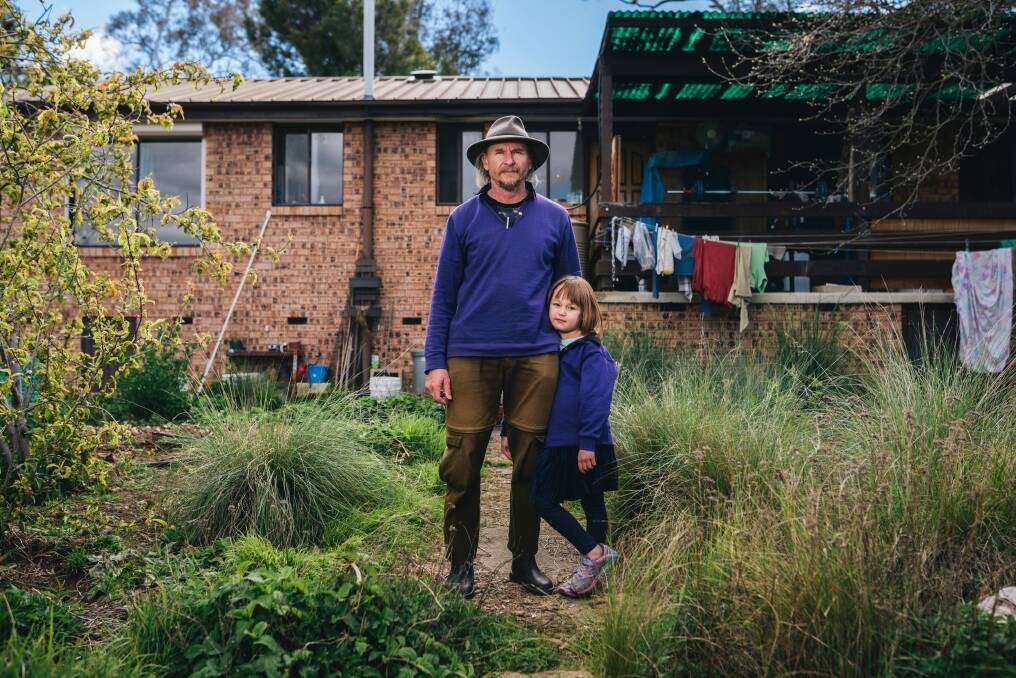 John Lieber and his daughter Fay, 6, at their home in O'Connor. Photo: Rohan Thomson