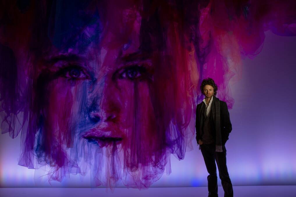 Artist Benjamin Shine with his artwork The Dance at Canberra Centre last year.

The Canberra Times

Photo Jamila Toderas Photo: Jamila Toderas