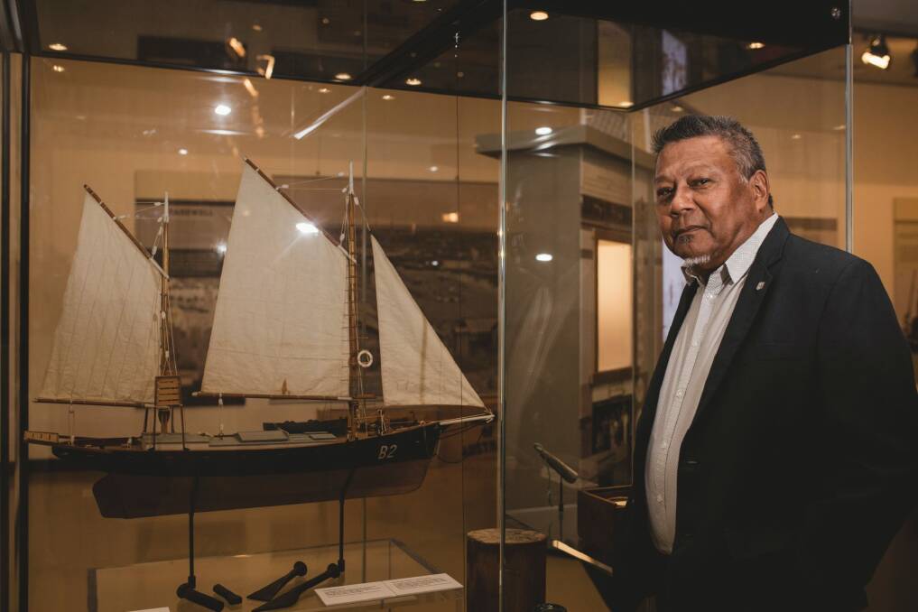 Peter Yu with a model of a wooden pearl lugger. Photo: Jamila Toderas