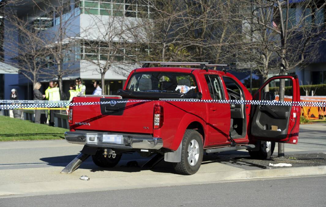 David Burnett crashed his ute into metal bollards in front of a building in Brindabella Business Park last September. Photo: Graham Tidy