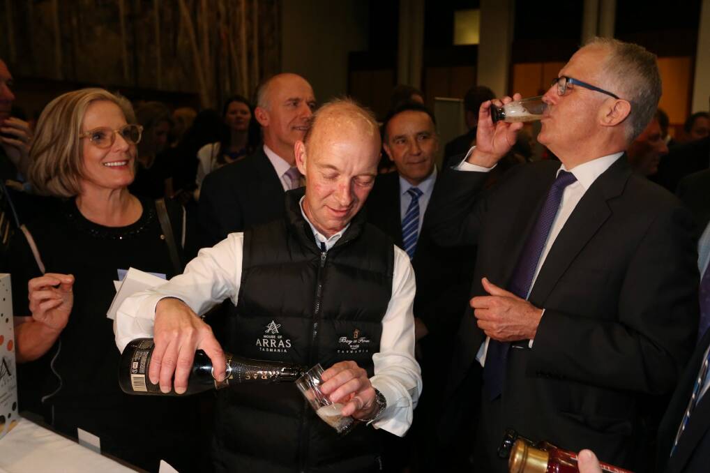 Prime Minister Malcolm Turnbull and wife Lucy sample sparkling wine at the Flavours of Tasmania event at Parliament House in Canberra. Photo: Andrew Meares