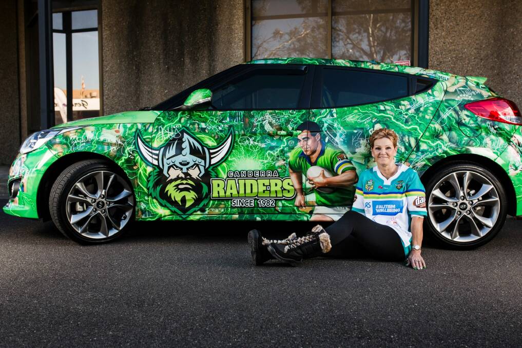 Sue Washington loves nothing more than Canberrans taking selfies with her little green pocket rocket. Photo: Jamila Toderas