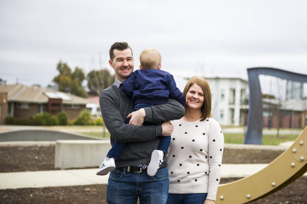 Luke and Aimee Griggs with their foster son.  Photo: Dion Georgopoulos