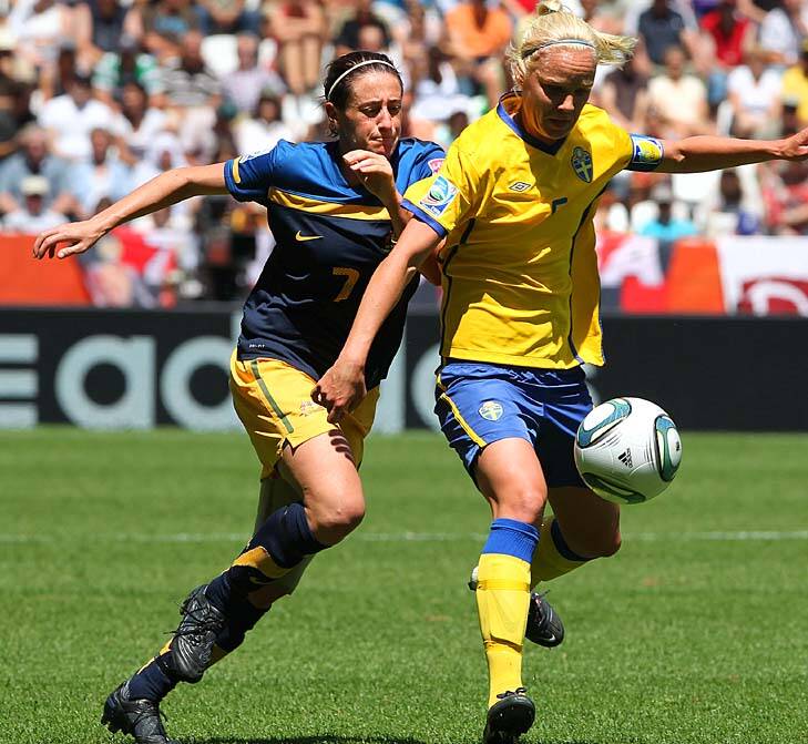 In her Matildas days, Heather Garriock (L) and Sweden's midfielder Caroline Seger vie for the ball. Photo: AFP