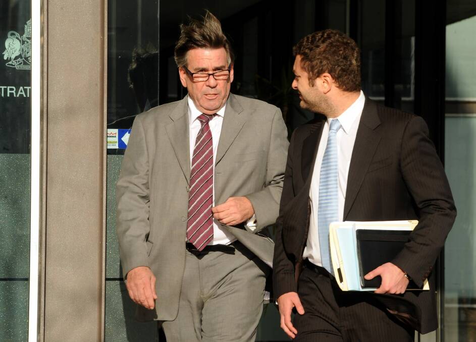 John Phillip Harrington leaves the ACT Magistrates Court in 2011. Photo: Gary Schafer