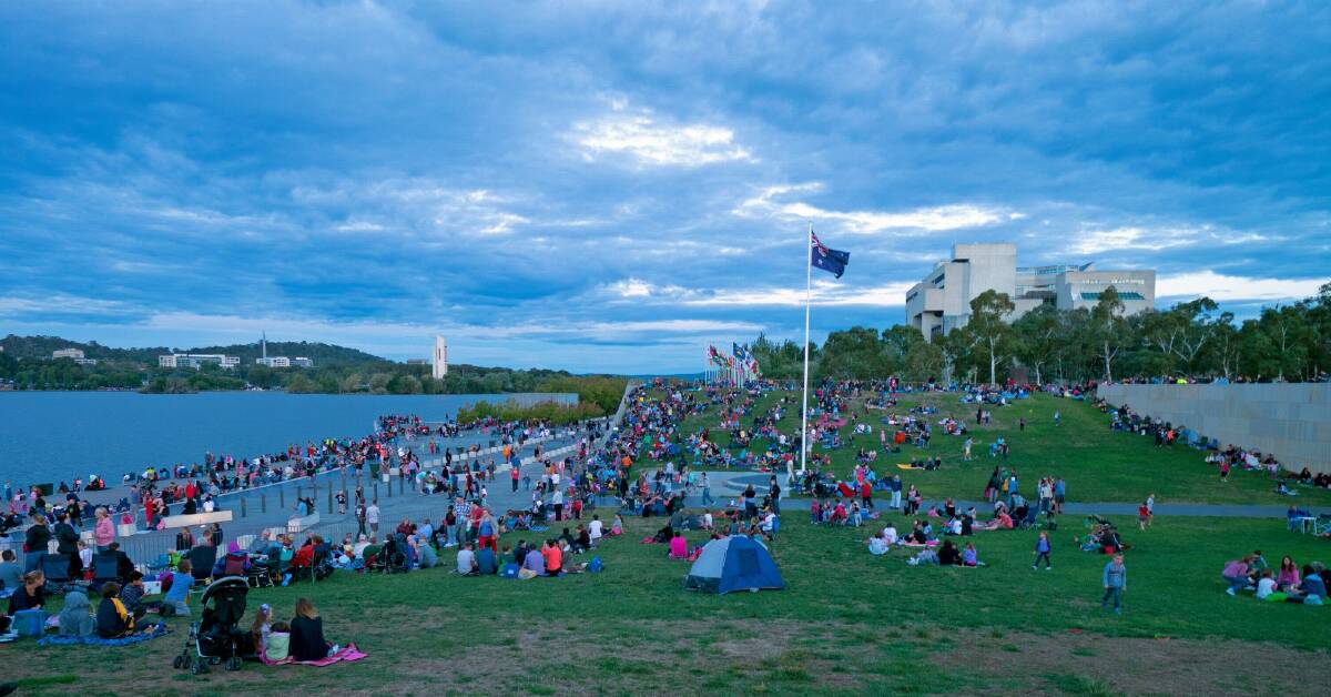 Chris Blunt's winning shot of crowds gathering on the shore of Lake Burley Griffin for Skyfire 2014. Photo: Chris Blunt