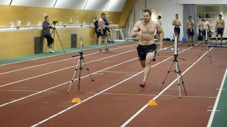 ACT Brumbies player Pat McCabe undergoes biometric testing in the AIS Indoor Athletics Track. Photo: Jeffrey Chan