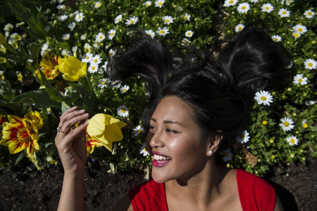 Alyssa Tenorio, of Boston, at a sunny spring Floriade.  Photo: Jay Cronan
