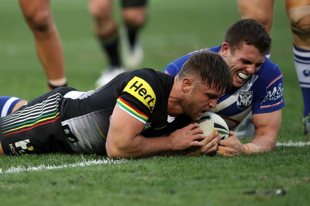 Rein storm: Mitch Rein goes over for a Penrith try.  Photo: Mark Kolbe