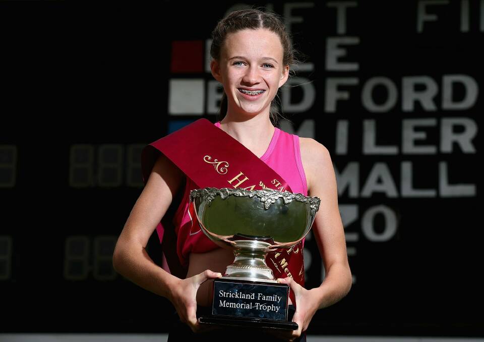 Talia Martin with the Stawell Gift trophy. Photo: Getty Images