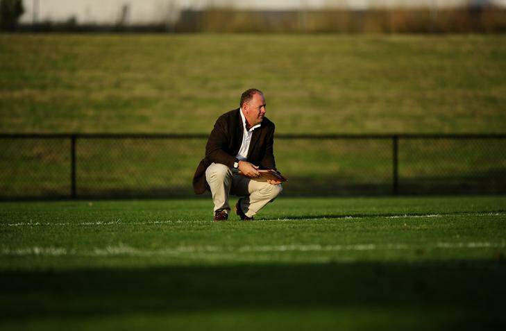 Photo from the Brumbies v ACT XV match at Greenway oval in February. Brumbies coach Jake White surveys the ground. Photo: Melissa Adams