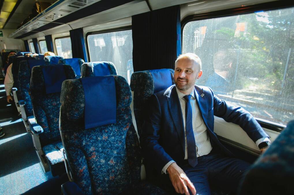 ACT Chief Minister Andrew Barr aboard a train to Sydney where he will meet with NSW Minister for Infrastructure Andrew Constance. Photo: Sitthixay Ditthavong