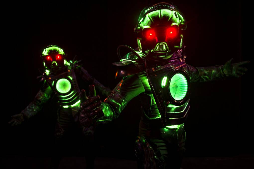The show's dancing robots pose for a photograph. Photo: Rohan Thomson