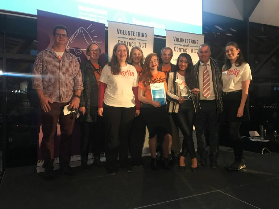 Some of the Canberra team of Orange Sky Laundry receiving the innovation award at the recent 2017 Volunteering Awards for the Canberra region. Photo: Supplied