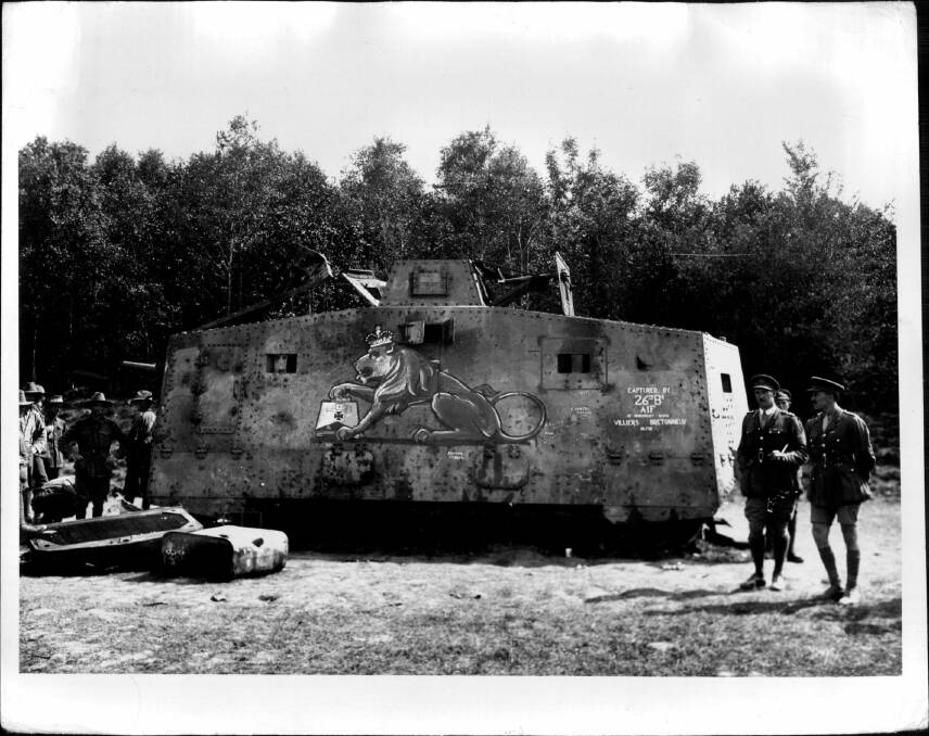 A German tank captured near Villers-Bretonneux,. The Germans had painted a German tank crushing a British lion. A British artist reversed the scene. Photo: Australian War Memorial