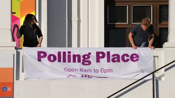 AEC and Old Parliament house staff ready the OPH for polling early on Saturday morning. Photo: Karleen minney