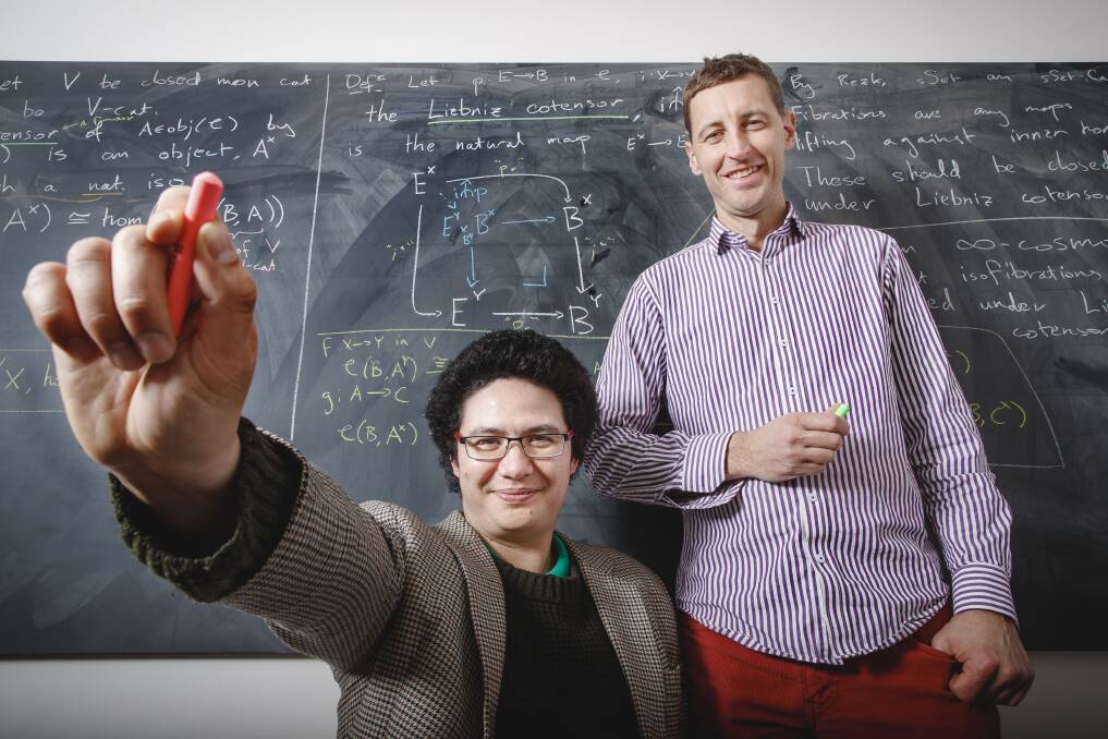 Australian National University PhD student Ivo Vekemans and Associate Professor Scott Morrison both prefer using blackboards to communicate complicated ideas to their peers.  Photo: Sitthixay Ditthavong
