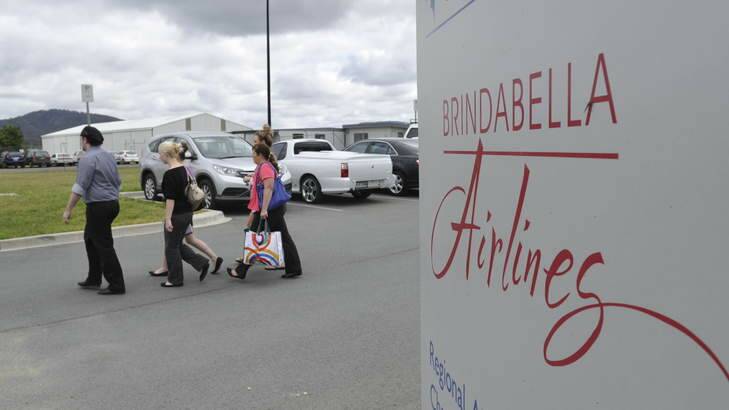Brindabella Airlines staff meeting at their airport offices. Photo: Graham Tidy