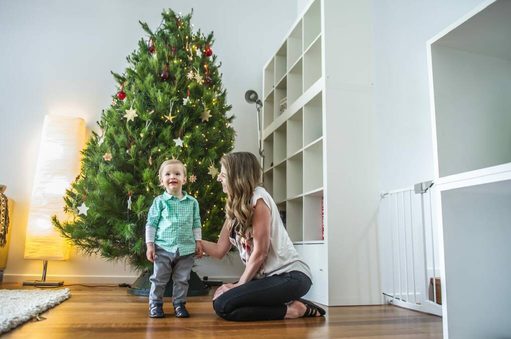 Sandra Feletti with 14-month-old son Marco Reed. It's just not Christmas for Sandra unless she has a real tree. Photo: Karleen Minney