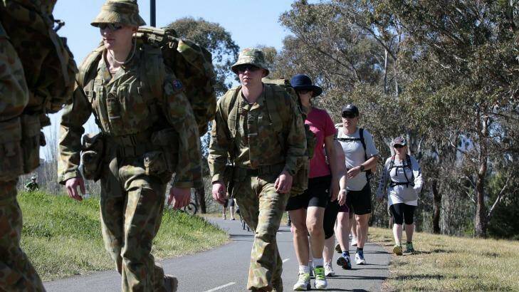 Current and former Navy, Army and Air Force members are walking 80km around Lake Burley Griffin as part of the  ANZAC Warriors Walk. Photo: Jeffrey Chan