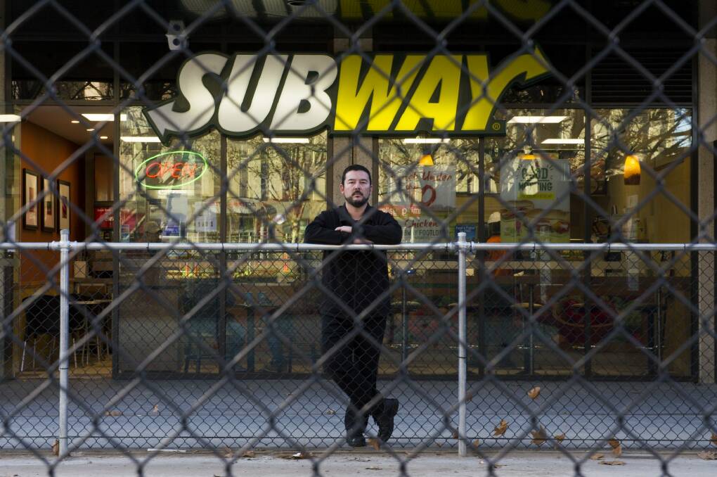 Businessman Tony Prior is fighting with developer Morris Property Group after a road was put in front of his Subway business, costing him a big percentage of his trade. Photo: Jay Cronan