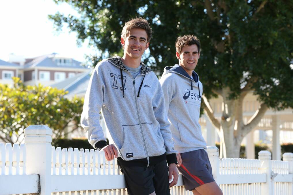 High jumper Brandon Star with older brother, Australian fast bowler Mitchell. Photo: Anthony Johnson
