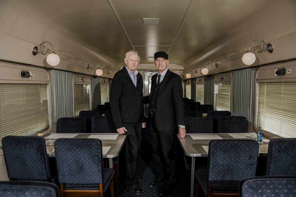 ACT Australian Railway Historical Society members Richard Robinson and Gary Reynolds inside one of the carriages. Photo: Jamila Toderas