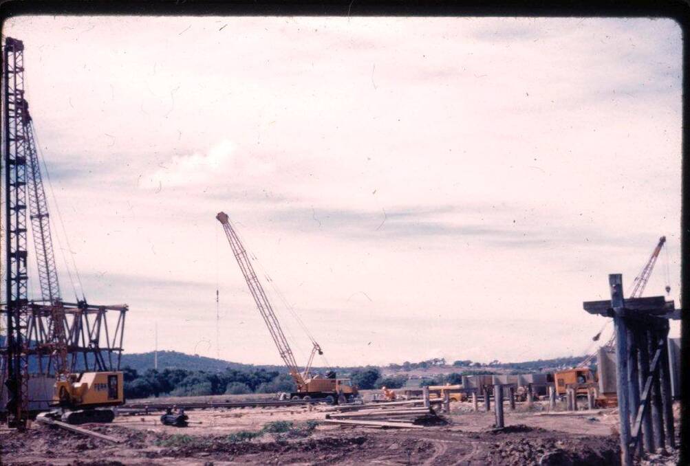 Lord William Graham Holford worked on the design of Lake Burley Griffin and its two
bridges. Undated photo of The Commonwealth Bridge under construction. Photo: Marilyn Gillard
