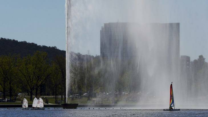 Calmer conditions: Water users take to Lake Burley Griffin on Friday Photo: Graham Tidy