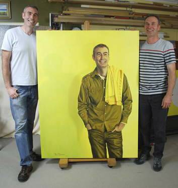 The former yellow Wiggles Greg Page with his portrait entered for the Archibald Prize by Canberra artist Ross Townsend, right, at Ross's studio at Gordon.