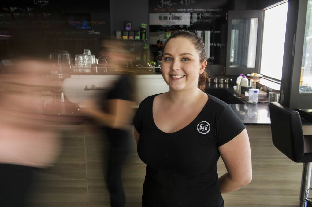 Bean 'n' Grind Espresso cafe owner Kelsey O'Callaghan says the possible light rail extension to Russell would benefit her business on Allara Street in Civic. Photo: Rohan Thomson