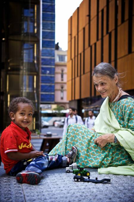 Australian nurse Valerie Browning in Sydney this week with her two-year-old adopted son Nabil. Photo: Wolter Peeters