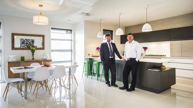Wayne Medlam and Roger Poels of Shaw Living at their display home in Crace. Photo: Rohan Thomson