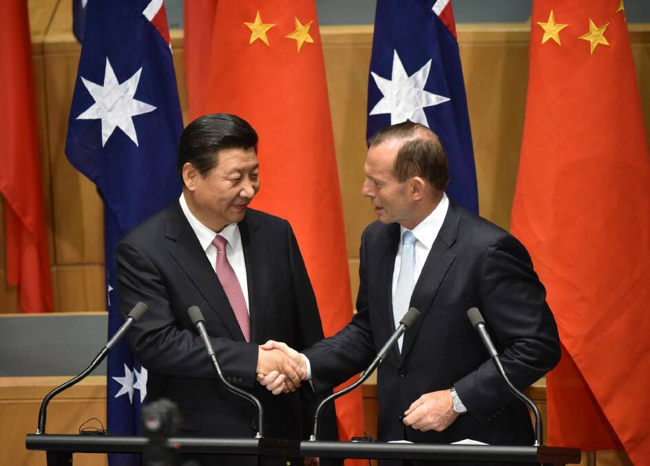 Free trade agreement: Chinese President Xi Jinping and Prime Minister Tony Abbott. Photo: Mark Graham