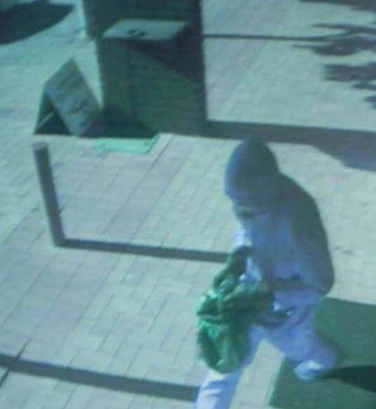 Image of Rivett Post Officer Offender - Note: The CCTV colour is poor and the actual clothing is darker than appears on CCTV. Photo: ACT Policing