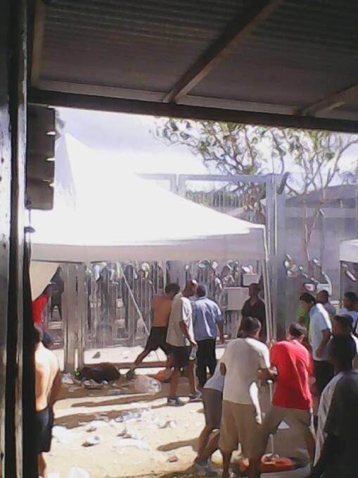 The Refugee Action Coalition says this picture shows the attacks on protesters at Manus Island on Friday.