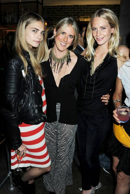 Fashion star: Kit Willow Podgornik (centre) with British fashion royalty Cara (L) and Poppy (R) Delevigne at a party in London in 2011.   Photo: Dave M. Benett