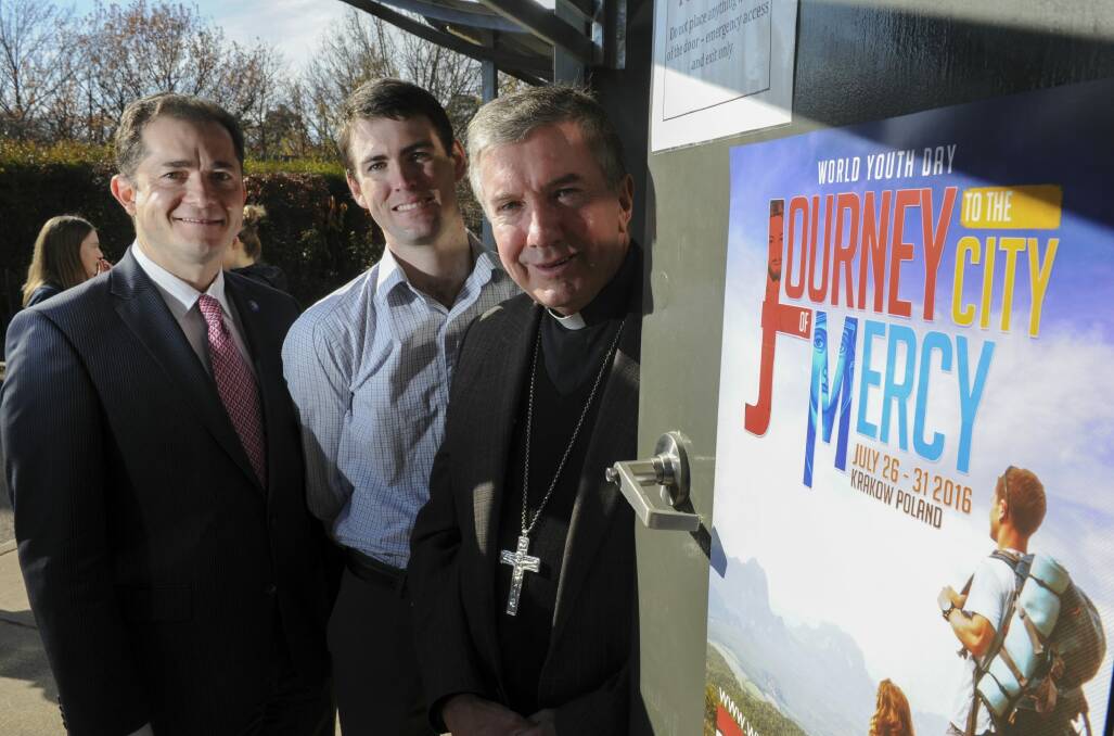 Sunday. Pilgrimage to World Youth Day launch at the Rheinberger Function Centre, Yarralumla. Polish Ambassador, Pawel Milewski, left and Archbishop Christopher Prowse, right are joined by pilgrimage leader Stuart West.  Photo: Graham Tidy
