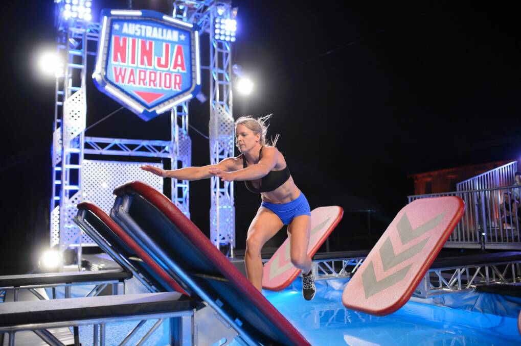 Zoe Featonby attempts the quintuple steps on the Australian Ninja Warrior course. Photo: Channel 9