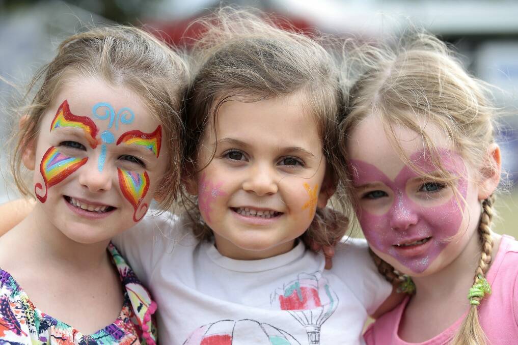 From left, Chloe Heycox, of Harrison, Lucinda Ovin, of Casey, and Zarah Heycox, of Harrison, each 4, had their faces painted at the show on Saturday.  Photo: Jeffrey Chan