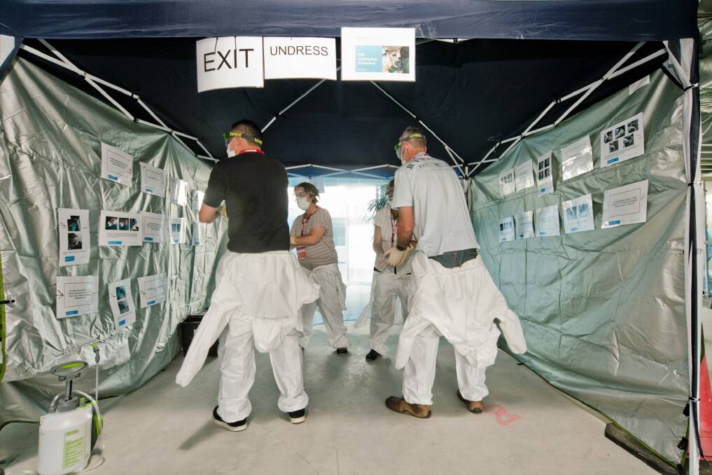 Healthcare workers complete predeployment training in Canberra to prepare them for working in West Africa as part of Australia's response to the Ebola crisis. Photo: Supplied