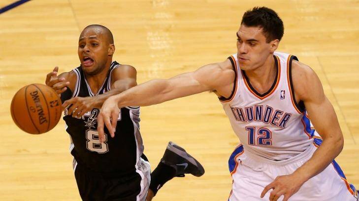 Patrick Mills battles with Steven Adams in game six on Sunday. Photo: AFP