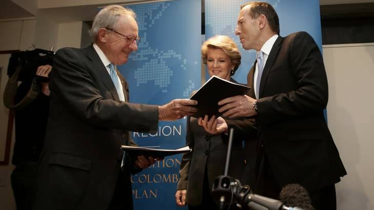 Kevin McCann, deputy opposition leader Julie Bishop and Opposition Leader Tony Abbott discuss the New Colombo Plan. Photo: Alex Ellinghausen