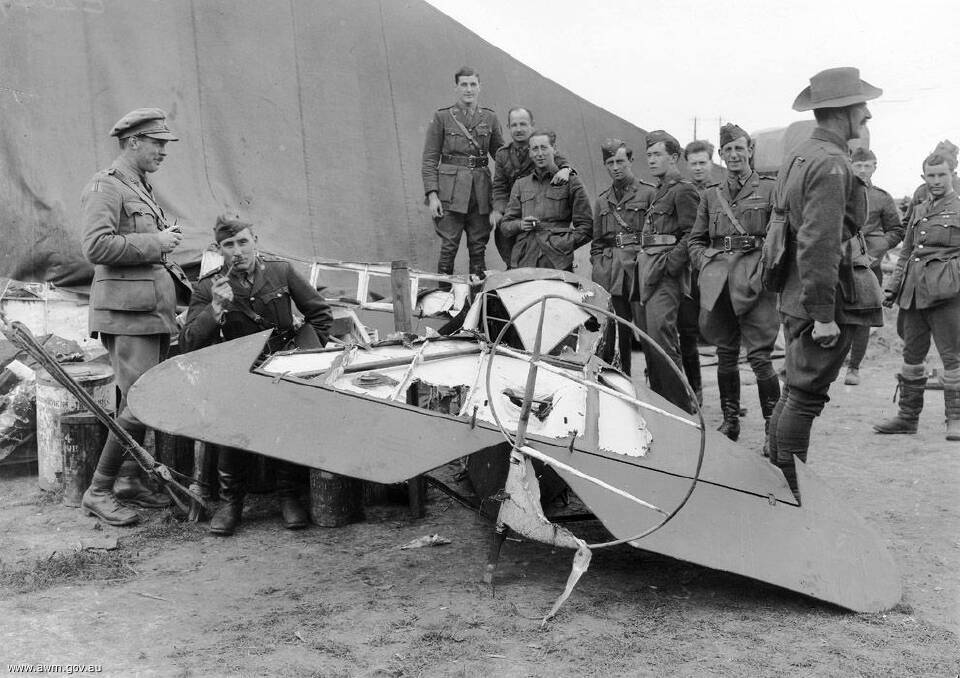 This iconic image of the Red Baron's crashed Fokker triplane, taken on April 22, 1918, is now believed to be the work of Australian war photographer, George Hubert Wilkins. Photo: Australian War Memorial