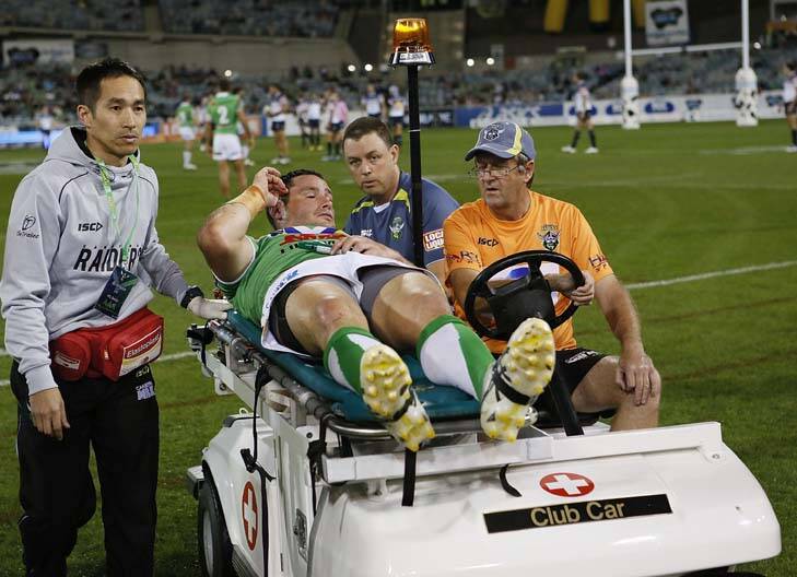 White out &#8230; Brett White is carted off after rupturing his ACL. Photo: Getty Images