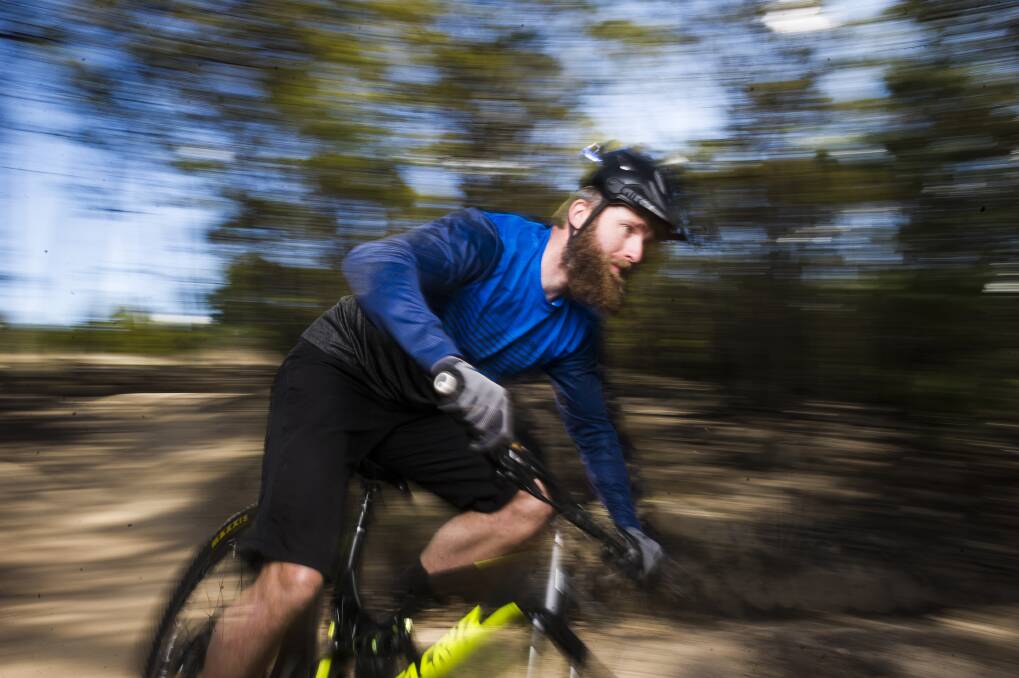 Mountain biker Josh Kentwell is calling on the ACT government to fund new and more challenging trails at Mt Stromlo. Photo: Dion Georgopoulos