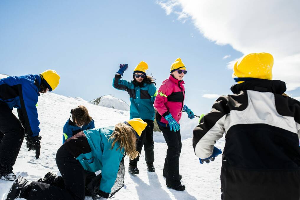 Year 6 students from Marian State School in central Queensland enjoy a snow fight. Photo: Rohan Thomson